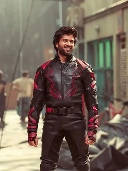 Action styling for Vijay Deverakonda's Thums Up campaign. We designed this custom black and red leather biker suit to create a powerful, heroic silhouette that stands out in high-energy sequences.