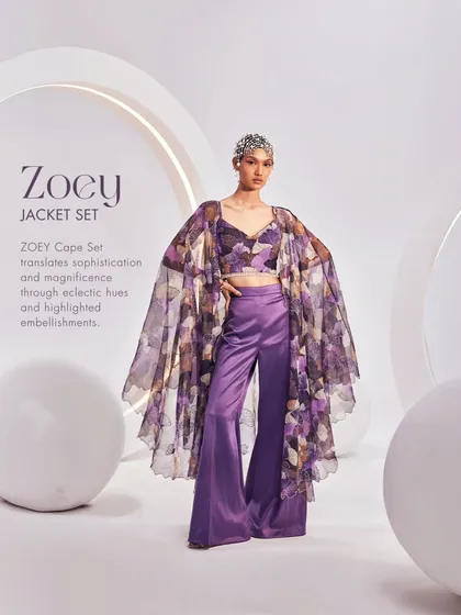 The Zoey Jacket Set, a variation with a long, flowing cape-style jacket, offering a different take on this magnificent purple print.