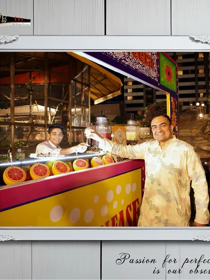 A guest enjoys a refreshing drink from our quirky "Squeeze Me" juice station at a Sufi Night.