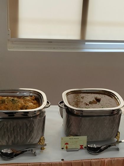 Another shot of the Indian main courses for a business lunch, showing the variety of vegetarian and non-vegetarian options available.