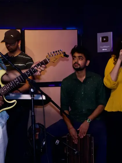 Collaboration is at the heart of our bootcamps. This is a snapshot of a jam session where students work together, combining guitar, vocals, and percussion to create music on the spot. It's a fantastic way to learn and connect with fellow musicians.