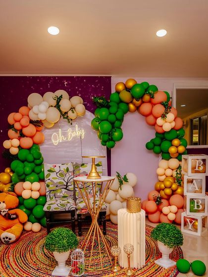 A duplicate of 159, this photo showcases the full setup of the baby shower, a perfect memory of the event's ambiance.