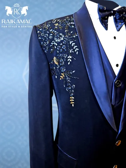 A side view of the navy blue tuxedo, capturing the regal feel of the entire ensemble.