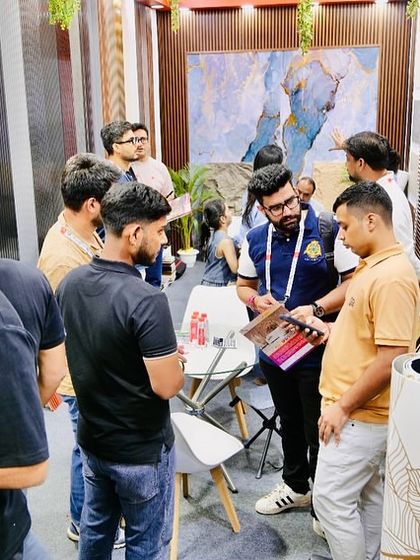 Our team explaining the unique features of our products to a crowd of interested visitors.