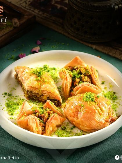 Sobiyet Baklava, a special variety made with flaky phyllo dough filled with a sweet, creamy mixture and nuts, then soaked in syrup.