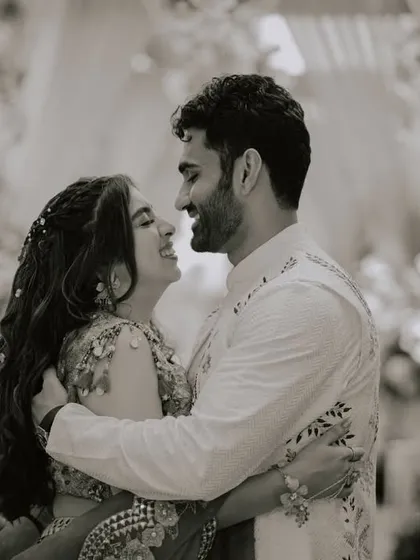 A black and white portrait filled with laughter and joy. Capturing the genuine happiness between a couple is at the core of what we do.