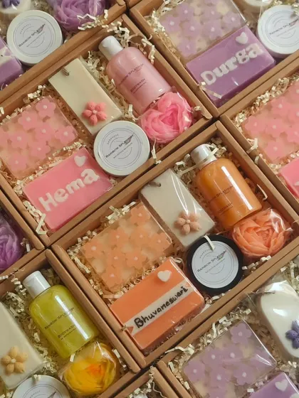 An inside look at the personalized Women's Day hampers, showing the custom name soaps and coordinated products.