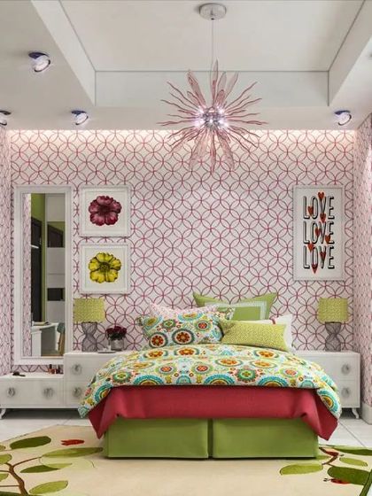 A vibrant and colorful bedroom design for a teenager, featuring patterned wallpaper, a dedicated study nook, and eclectic decor.