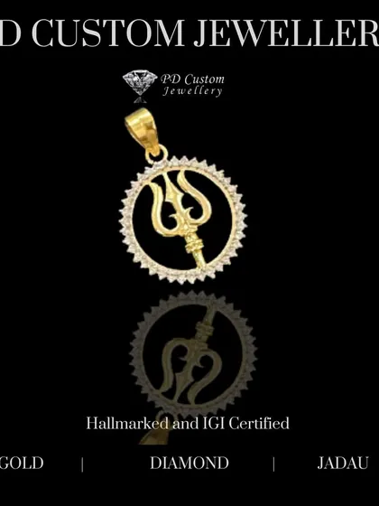 A powerful gold and diamond Trishul pendant. This symbol of Lord Shiva is crafted with a diamond-studded circle, representing divine energy and protection.