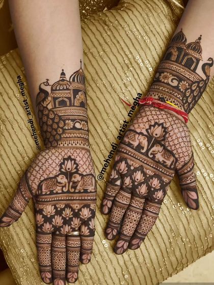 A majestic bridal design featuring palace architecture on the arms and elephants with lotuses on the palms. This style is perfect for a bride who wants a royal and traditional look.