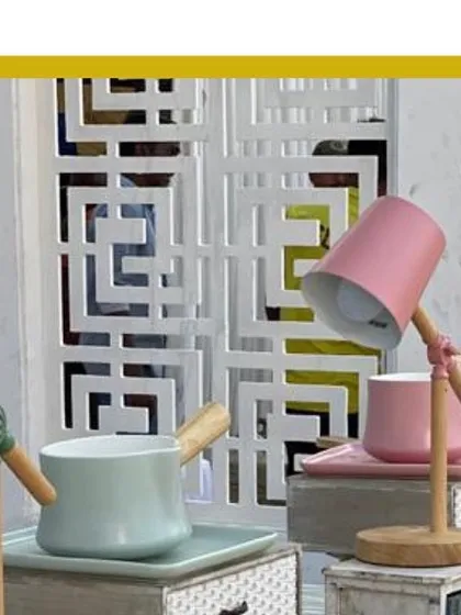 A close-up of our charming pastel-themed decor, featuring small, colorful lamps and serving pots that add a playful yet elegant touch to the food station.
