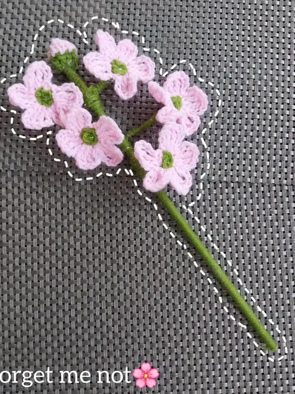 A delicate stem of pink forget-me-not flowers. The name itself makes it a meaningful gift for someone you'll always cherish.