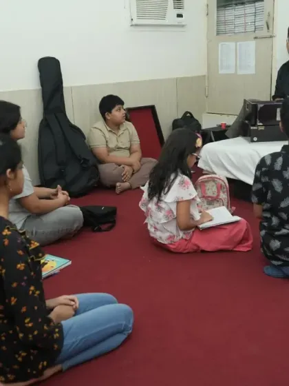This is where the magic begins. A glimpse into one of our vocal music classes in Gurgaon, where students are deeply engaged in learning the fundamentals of music theory and practice in a supportive group setting.