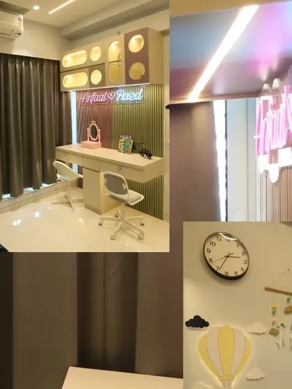 Details of the study area, including the custom neon name sign and whimsical hot air balloon wall light, which add a personal and playful touch to the room.