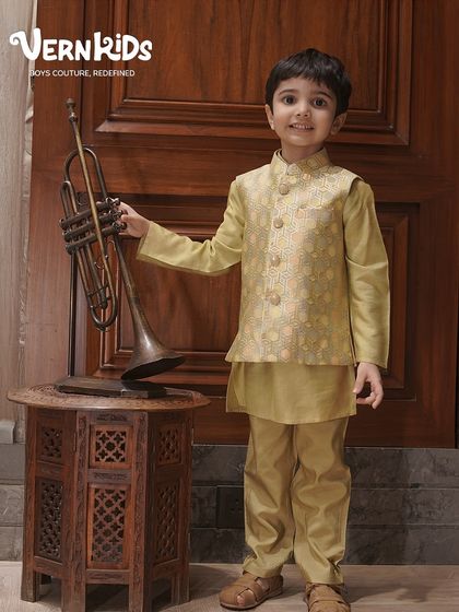 Festive vibes, Vern Kids style. This golden-beige Bundi set is the perfect blend of subtle elegance and comfort, just what your boy needs to shine this festive season.