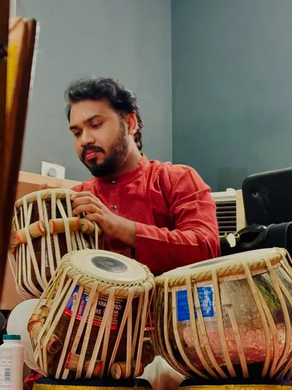A quiet moment of preparation in the green room before a concert in Bangalore. Tuning the tabla is a meditative process that helps me center myself before going on stage.
