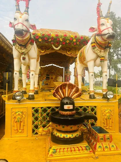 I specialize in decorating procession chariots (Ratha Gadi), creating elaborate mobile stages with deity statues, like this one featuring Lord Shiva and Nandi.