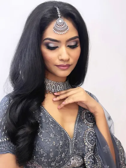 This shot highlights the beautiful shimmer on the eyelids and the perfectly blended crease.
