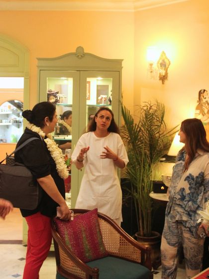 Holding space and sharing wisdom with the group in Jaipur. My role is to guide the conversation and practices, creating a safe container for everyone to explore and share.