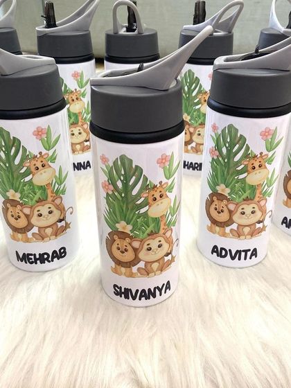 Another view of our jungle-themed sipper bottles, showing the convenient flip-top spout that's easy for little hands to use.
