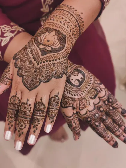 A beautiful design combining a lotus on one hand and an elephant on the other. The mix of motifs makes it unique and personal.