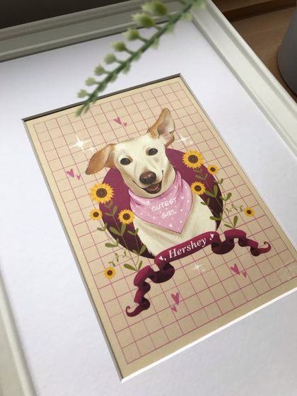 A close-up of the framed digital portrait of Hershey. The white frame and matting make the bright colors of the illustration stand out beautifully.