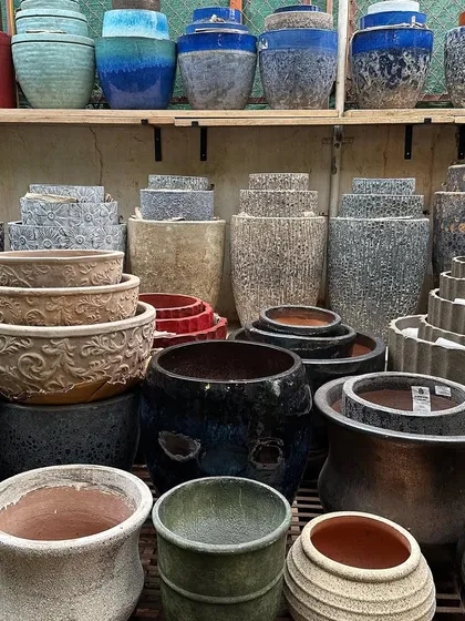 A look at my new rustic planters collection on display. You can see the variety of finishes, from earthy terracotta tones to dark, textured glazes and classic Atlantis styles, all available in my studio.