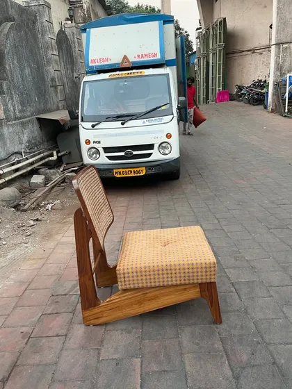 A single 'Kangaroo' chair ready for delivery. You can see the distinct Z-shaped profile that makes this design so unique.
