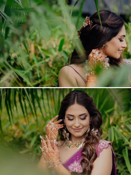 A close-up of the bride framed by lush green foliage, a beautiful and natural portrait.