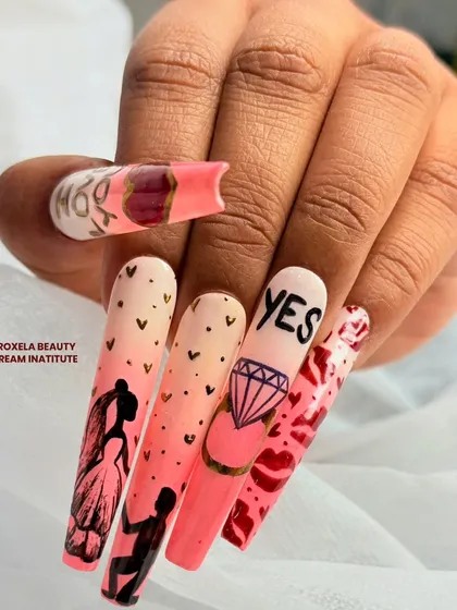 The perfect "I do" accessory. This custom bridal set tells a love story with hand-painted silhouettes, a sparkling diamond design, and the all-important "YES" on extra-long coffin nails.