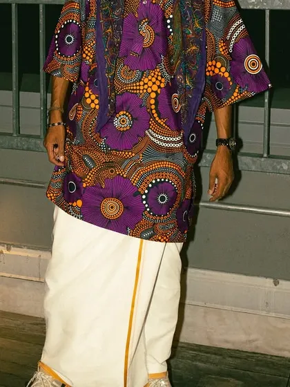 My style is a reflection of my music. Here I'm pairing a traditional South Indian veshti with a vibrant African print shirt for a show in NYC. It's all about the fusion.