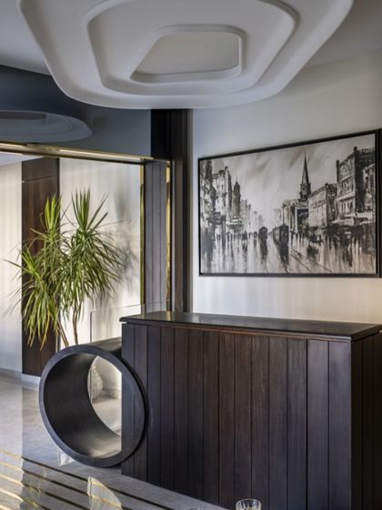 In a compact duplex, every inch matters. This hidden TV unit pops up only when needed, keeping the space sleek and clutter-free. It's a small detail that makes a big impact on modern living.