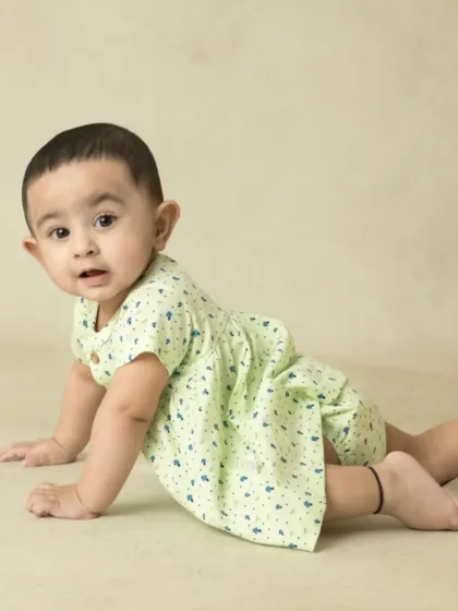 A collection of simple, classic portraits of twin babies. Without props or themes, their individual expressions and connection are beautifully highlighted.