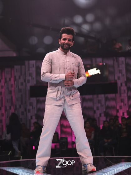 A full-stage view of Jay Bhanushali in our custom pleated kurta set, commanding the audience's attention.