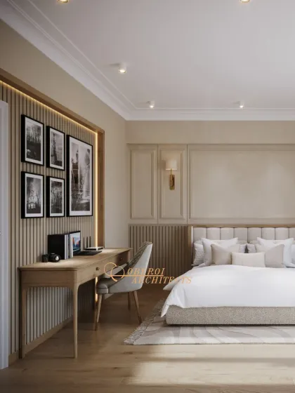 This angle shows the integrated workspace and gallery wall, adding a personal and productive element to the tranquil bedroom setting.