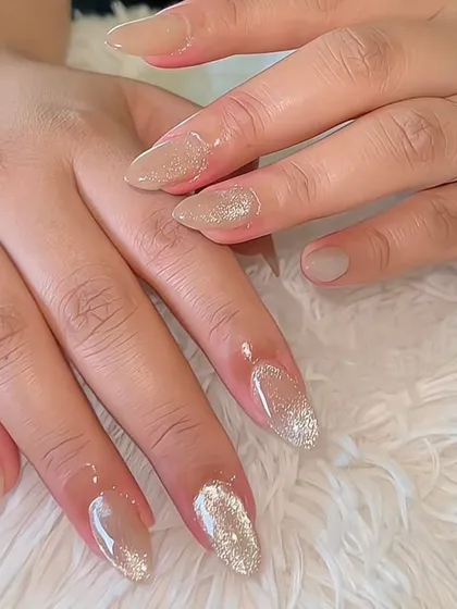 A subtle nude glitter ombre. This is a perfect choice for clients who want a bit of sparkle without being too flashy.