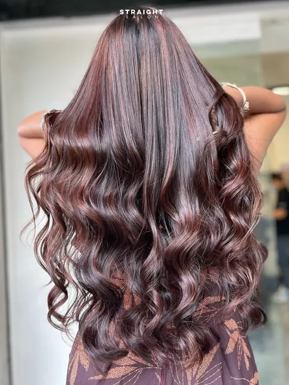 This is what I call goddess energy. A full head of rich, glossy burgundy waves that catch the light from every angle, showing off the deep color dimension.