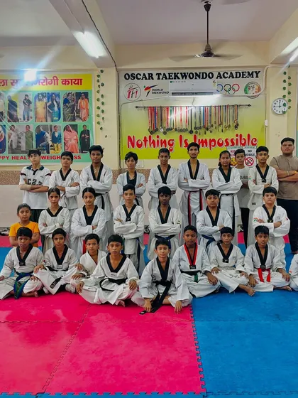 The Oscar Taekwondo Academy team. A group of disciplined students from different belt levels, all united by the goal of becoming champions.