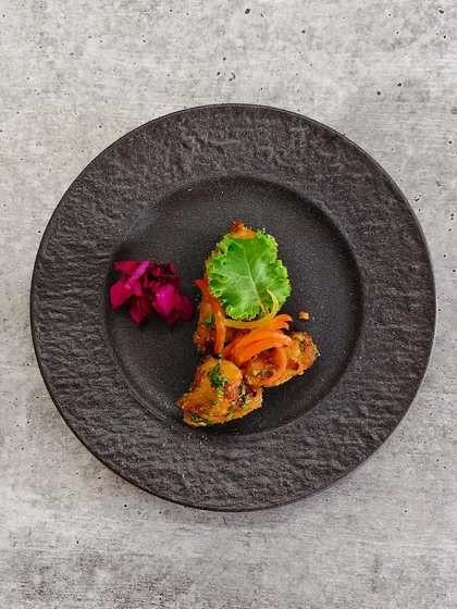 From the backwaters of Kerala, we bring you a taste of its magic, served crispy in these podi fish cakes.