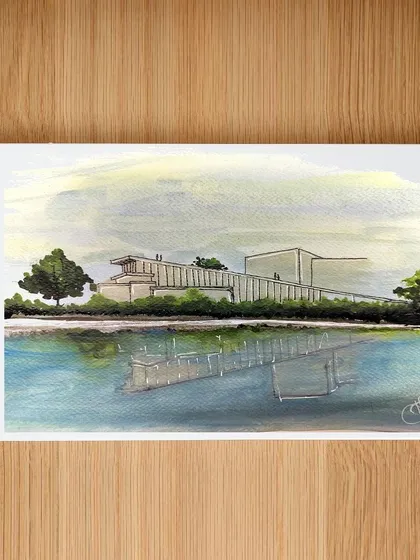 Sketches are where our innovation begins. This beautiful watercolor sketch of a building reflected in water shows the initial creative spark that evolves into our architectural wonders, blending artistic vision with technical expertise.