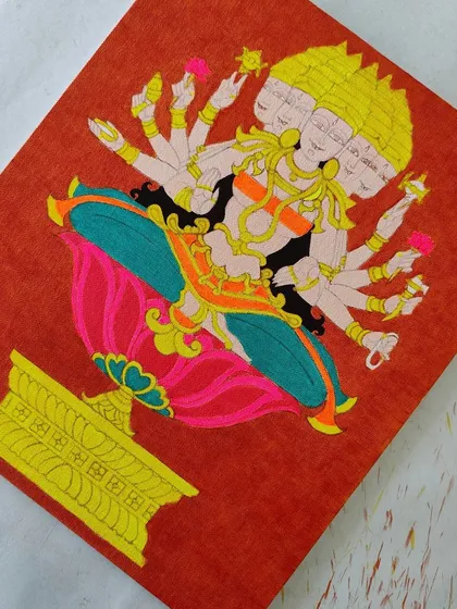 The Gayatri Devi painting with the base colors blocked in. The vibrant orange, pink, and teal create a beautiful, harmonious palette.