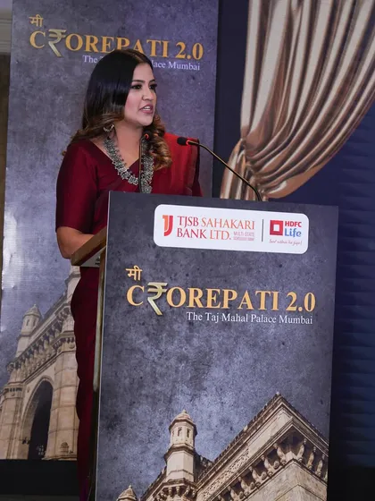 Speaking at the "Me Crorepati 2.0" event. The backdrop of the Taj Mahal Palace added a layer of prestige to this financial awards ceremony.