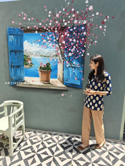 This 3D window mural was created for a cafe to give the feeling of looking out onto a beautiful view. I teach this trompe l'oeil technique to create depth and illusion in my mural course.