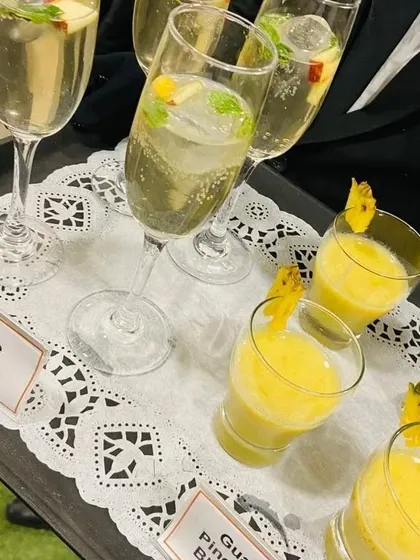 An elegant presentation of our welcome drinks. We served Apple Mojitos in champagne flutes and Guava Pineapple Blossom in smaller glasses for a sophisticated corporate meet.