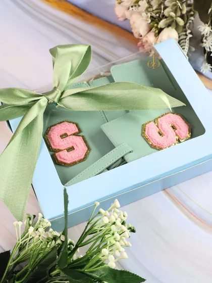 The mint green travel combo, beautifully packaged in a gift box with a green satin ribbon.