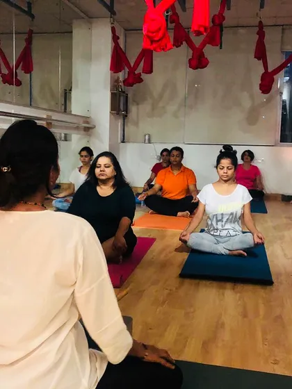 A moment of shared stillness during a lunar eclipse meditation session. We gather to harness the quiet energy of the moon, turning inward to find peace and clarity as a community.