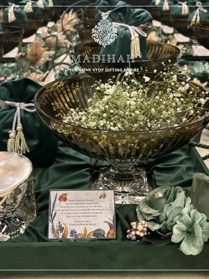 The deep green velvet and smoked crystal are a match made in heaven. This hamper is perfect for a sophisticated, modern wedding.