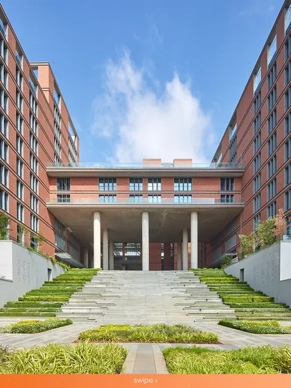 The grand, terraced staircase at the Wipro Hyderabad Campus is a testament to our belief in creating functional, community-oriented landscapes. These steps are not just for circulation; they serve as an amphitheater for gatherings and are integrated with greenery to cool incoming breezes, blending social space with sustainable design.