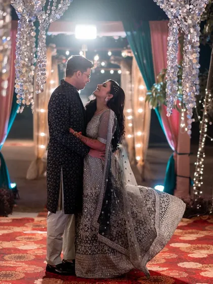 Dancing under a canopy of twinkling lights. I love capturing the magic of nighttime shoots, using creative lighting to create an atmosphere that is both celebratory and deeply romantic.
