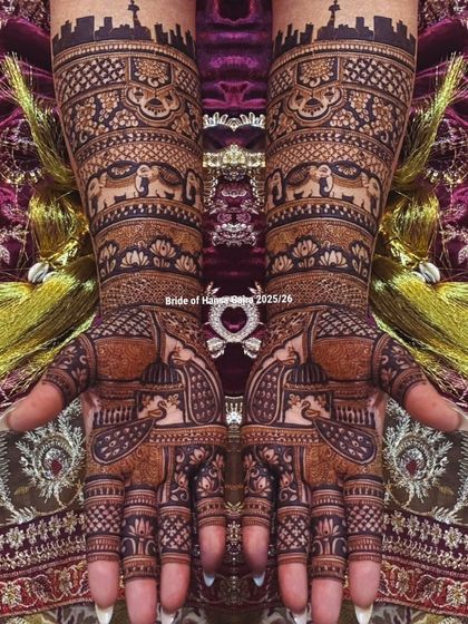 A truly royal design where tradition meets storytelling. This full-coverage mehendi features majestic elephants, a city skyline, and intricate jaali patterns for a grand bridal look.